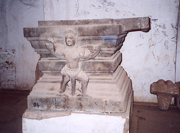 Garuda carving on a large pedestal at Wat Po Veal.
