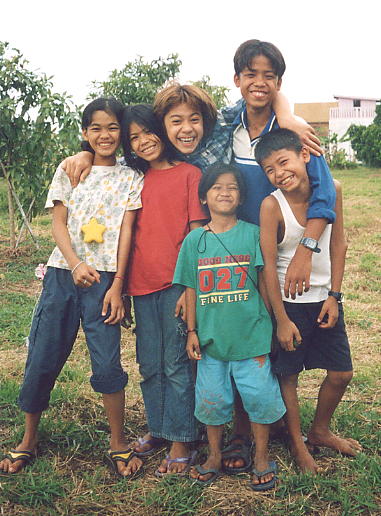 These youngsters were a cheeky bunch who led me a merry dance at a friend's party in Phnom Penh.